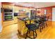 Modern kitchen with stainless steel appliances and a breakfast bar at 1028 Ridge Ave, Stone Mountain, GA 30083