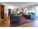 Open living room with hardwood floors and plenty of natural light at 1028 Ridge Ave, Stone Mountain, GA 30083