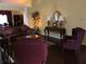 Living room with dark hardwood floors and elegant furnishings at 514 Martin Forest Ln, Lawrenceville, GA 30045