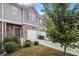 Brick townhome with attached garage and landscaping at 8443 Douglass Trl, Jonesboro, GA 30236