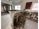Kitchen with breakfast bar and tile floor during renovation process at 6415 Grey Fox Way, Riverdale, GA 30296