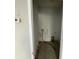 Laundry room with tile floor, washer/dryer hookups, and some areas requiring attention at 6415 Grey Fox Way, Riverdale, GA 30296