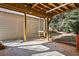 Covered patio provides an outdoor space with shade at 1012 Davis Mill S Rd, Dallas, GA 30157