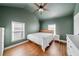 Bedroom with vaulted ceilings, wood floors, and large windows at 2742 Oakland Ter, Decatur, GA 30032