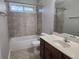 Clean bathroom with a shower/tub combo and updated vanity at 1812 Lakewood Se Ave, Atlanta, GA 30315