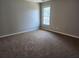 Spacious bedroom with carpet and neutral wall decor at 1812 Lakewood Se Ave, Atlanta, GA 30315