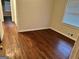 Well-lit bedroom with dark hardwood floors at 2962 Mcafee Rd, Decatur, GA 30032