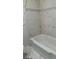 Updated bathroom with new bathtub and stylish tile at 2962 Mcafee Rd, Decatur, GA 30032