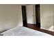 Spacious bedroom with hardwood floors and a large closet at 2962 Mcafee Rd, Decatur, GA 30032