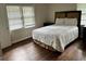 Bright bedroom featuring hardwood floors and ample natural light at 2962 Mcafee Rd, Decatur, GA 30032