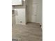 New kitchen flooring and white cabinets at 2962 Mcafee Rd, Decatur, GA 30032