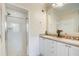Double vanity bathroom with shower and white tile at 4100 Paces Se Walk # 1306, Atlanta, GA 30339
