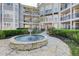 Beautiful courtyard with a fountain and landscaping at 4100 Paces Se Walk # 1306, Atlanta, GA 30339