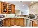 Kitchen with stainless steel appliances and wood cabinets at 4100 Paces Se Walk # 1306, Atlanta, GA 30339