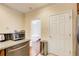 Modern kitchen features stainless steel appliances and granite countertops at 4100 Paces Se Walk # 1306, Atlanta, GA 30339