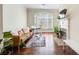 Living room features hardwood floors, fireplace and large windows at 4100 Paces Se Walk # 1306, Atlanta, GA 30339
