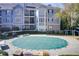 Community pool with a safety cover at 4100 Paces Se Walk # 1306, Atlanta, GA 30339