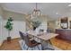 Elegant dining room with a modern table and four leather chairs at 393 Georgia Se Ave, Atlanta, GA 30312