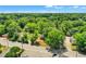 Aerial view of a house with a large lot and surrounding trees at 1162 Joseph E Boone Nw Blvd, Atlanta, GA 30314