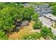 Aerial view showing a house on a lot near commercial buildings and townhomes at 1162 Joseph E Boone Nw Blvd, Atlanta, GA 30314