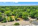 Aerial view of a residential area with a house and surrounding trees at 1162 Joseph E Boone Nw Blvd, Atlanta, GA 30314
