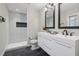 Elegant bathroom with double vanity and a large walk-in shower at 2349 Springdale Sw Rd, Atlanta, GA 30315