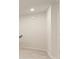 Bright hallway with white walls and neutral-toned flooring at 4187 Viola Pl, Atlanta, GA 30349