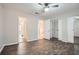 Spacious bedroom featuring wood-look floors and ample closet space at 6424 Woodstone Way, Morrow, GA 30260