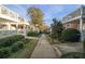 Central courtyard with walkway and lush landscaping at 869 Briarcliff Ne Rd # B20, Atlanta, GA 30306