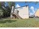 Two story house exterior with deck and fenced backyard at 909 Galloway Ct, Mcdonough, GA 30253