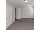 Spacious bedroom with neutral carpeting and double closets at 909 Galloway Ct, Mcdonough, GA 30253