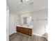 Bathroom with double vanity and grey flooring at 909 Galloway Ct, Mcdonough, GA 30253