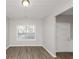Simple dining room with hardwood floors and window at 909 Galloway Ct, Mcdonough, GA 30253