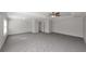 Large bedroom with ceiling fan and carpet at 909 Galloway Ct, Mcdonough, GA 30253