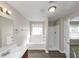 Bathroom with tub, shower, and vanity at 909 Galloway Ct, Mcdonough, GA 30253