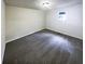 Simple bedroom with grey carpet and a single window at 4405 Cary Dr, Snellville, GA 30039