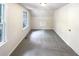 Spacious bedroom with grey carpet and a built-in cabinet at 4405 Cary Dr, Snellville, GA 30039