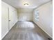 Bright bedroom with carpet flooring, ample closet space, and a window at 4405 Cary Dr, Snellville, GA 30039