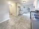 Clean and functional kitchen with stainless steel appliances and tile flooring at 4405 Cary Dr, Snellville, GA 30039