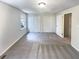 Spacious bedroom featuring dual closets and a window with natural light at 4405 Cary Dr, Snellville, GA 30039