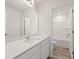 Clean bathroom with a single vanity, tub, and shower at 4171 Viola Pl, Atlanta, GA 30349