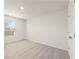 Bright bedroom with carpeted floor, large window, and neutral walls at 4171 Viola Pl, Atlanta, GA 30349