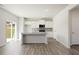 Modern kitchen featuring a large island and stainless steel appliances at 4171 Viola Pl, Atlanta, GA 30349