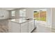 Kitchen island with granite countertop, offering extra prep space at 4171 Viola Pl, Atlanta, GA 30349