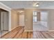 Light and bright entryway with hardwood floors and neutral paint at 468 Bradford Place Ln, Loganville, GA 30052