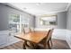 Bright dining room with a wood table and four chairs at 6634 Pine Valley Trce, Stone Mountain, GA 30087