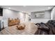 Spacious living room featuring a fireplace and hardwood floors at 6634 Pine Valley Trce, Stone Mountain, GA 30087
