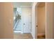 Elegant hallway with staircase and additional storage at 7675 Homer Dr, Cumming, GA 30028