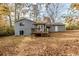 House exterior with deck and large backyard at 9887 Live Oak Ct, Douglasville, GA 30135