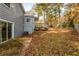 House exterior with deck and large backyard at 9887 Live Oak Ct, Douglasville, GA 30135